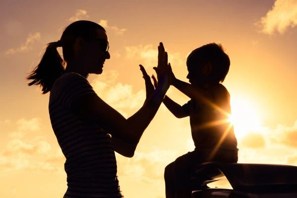 Image of happy mother and child after resolving child arrangements Stafford